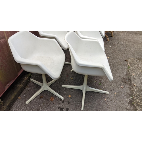 255 - Robin Day for Hille Furniture - A set of six mid 20th century chairs, with white powder coated tube ... 