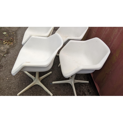 255 - Robin Day for Hille Furniture - A set of six mid 20th century chairs, with white powder coated tube ... 