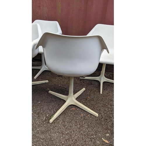 255 - Robin Day for Hille Furniture - A set of six mid 20th century chairs, with white powder coated tube ... 