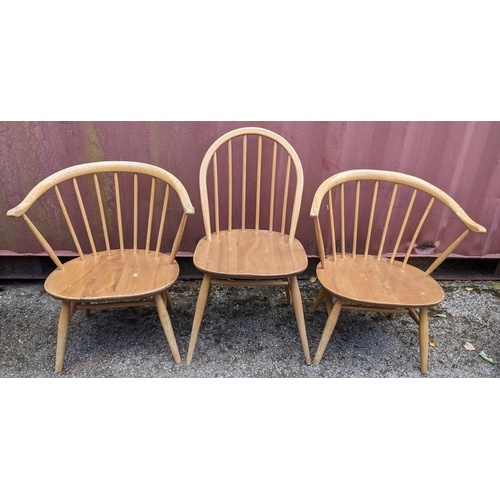 258 - Three mid 20th century Ercol light elm and beech chairs to include a single hoop back dining chair a... 