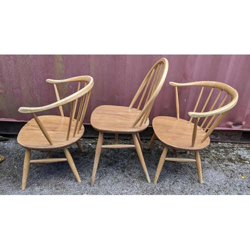 258 - Three mid 20th century Ercol light elm and beech chairs to include a single hoop back dining chair a... 