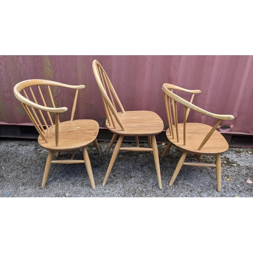 258 - Three mid 20th century Ercol light elm and beech chairs to include a single hoop back dining chair a... 