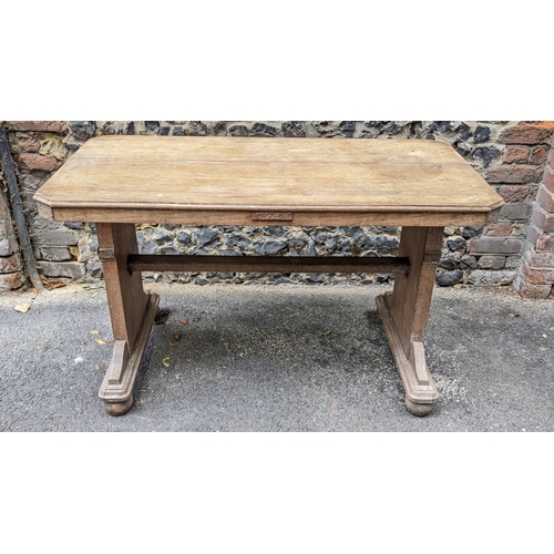 259 - A 1930s Heals style limed oak extending dining table, having an octagonal top with two fall flaps hi... 