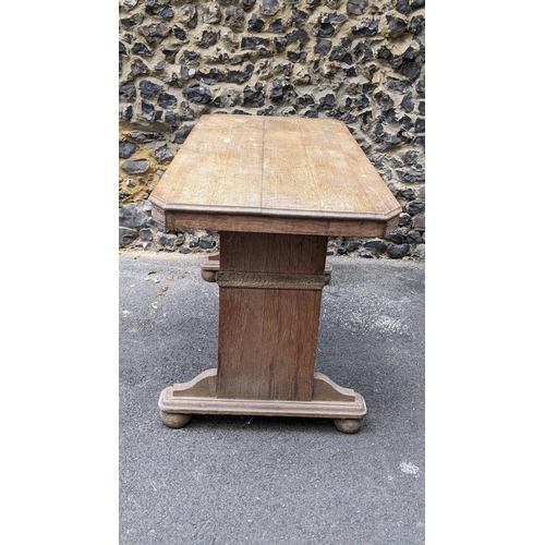 259 - A 1930s Heals style limed oak extending dining table, having an octagonal top with two fall flaps hi... 