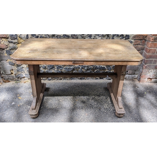 259 - A 1930s Heals style limed oak extending dining table, having an octagonal top with two fall flaps hi... 