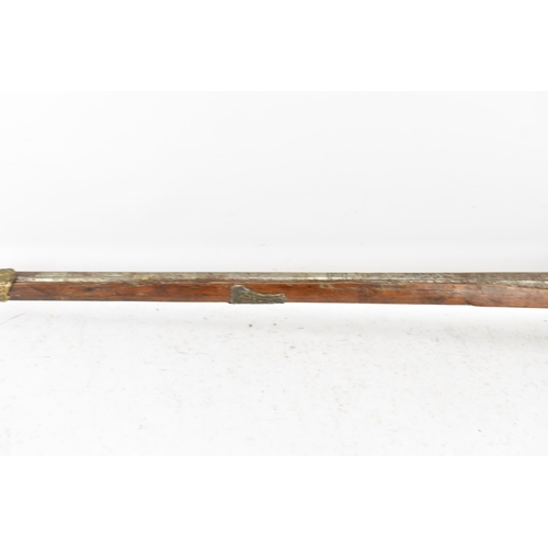 261 - A 19th century Middle Eastern flintlock action Jezail rifle, the barrel engraved with scroll design,... 