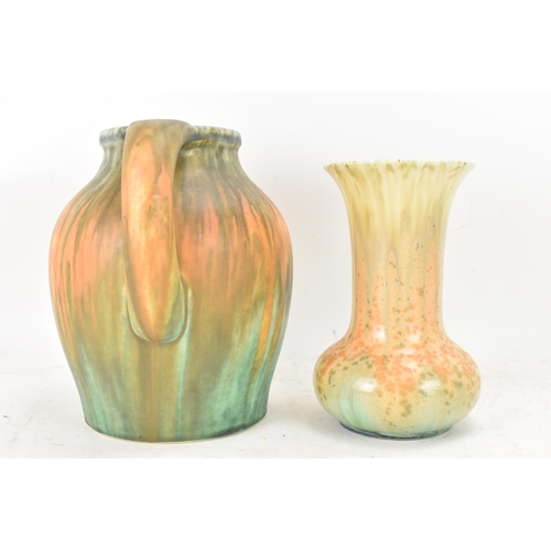 270 - Ruskin 1930s, a studio pottery jug and trumpet vase, each with multi-coloured trailing glazes, impre... 