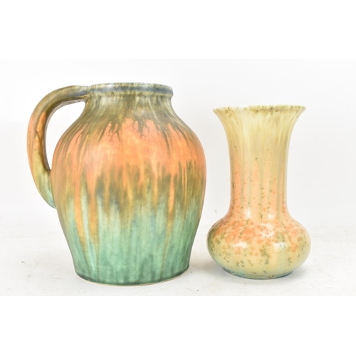 270 - Ruskin 1930s, a studio pottery jug and trumpet vase, each with multi-coloured trailing glazes, impre... 