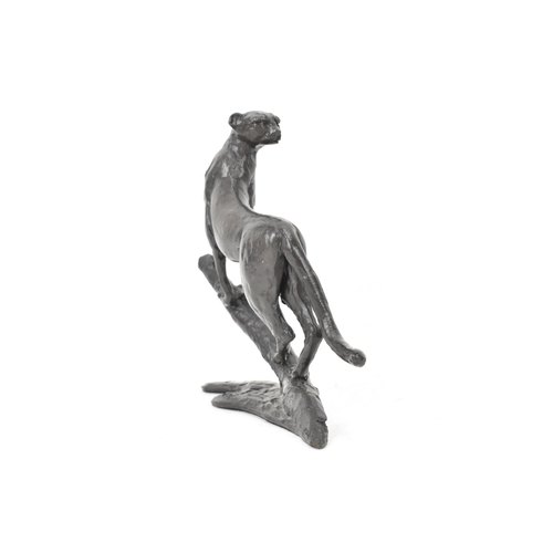 32 - Jonathan Saunders - a patinated bronze model of a cheetah on a branch limited 52/250 stamped and ini... 