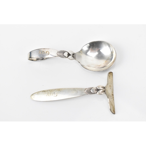 34 - Georg Jensen Danish sterling silver cutlery, comprising a spoon with a pierced handle 15cm, a baby f... 