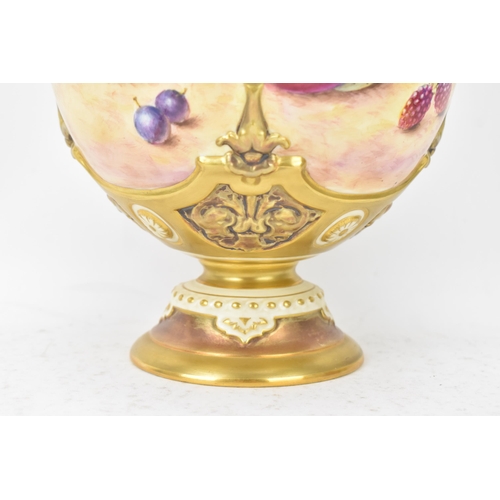 36 - A Royal Worcester porcelain twin handled pedestal vase and cover of baluster form, shape no. 1691, p... 