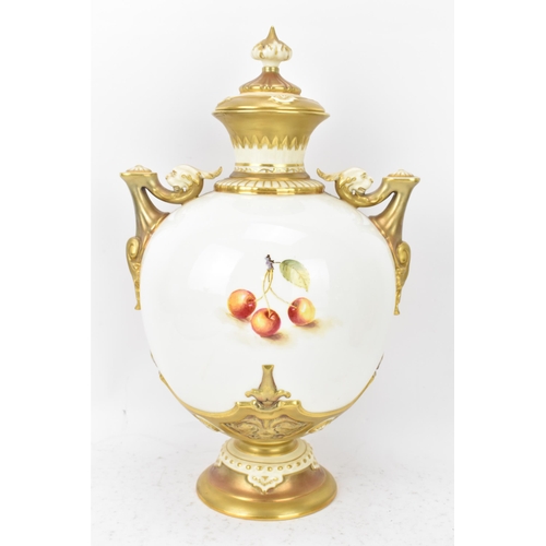 36 - A Royal Worcester porcelain twin handled pedestal vase and cover of baluster form, shape no. 1691, p... 