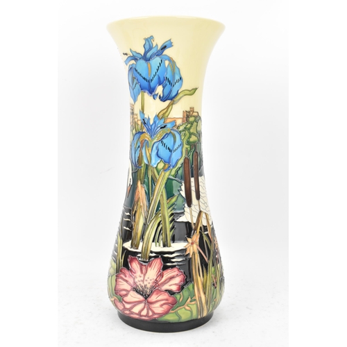 41 - A Moorcroft pottery 'Vision of Windsor' pattern trial piece vase, of tapering form, tube lined decor... 