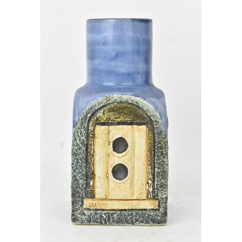 44 - A Troika pottery spice jar by Tina Doubleday, the four sides with incised geometric designs on a blu... 