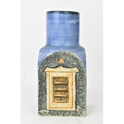 44 - A Troika pottery spice jar by Tina Doubleday, the four sides with incised geometric designs on a blu... 