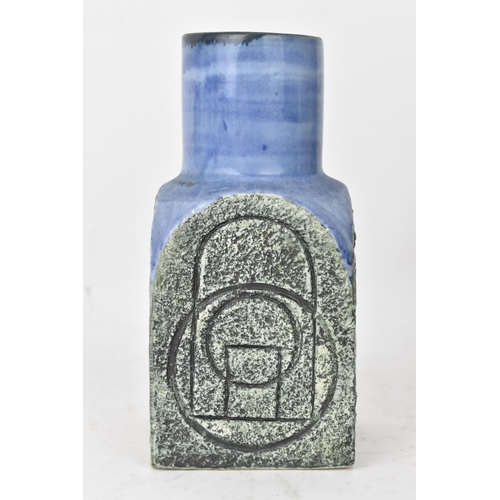 44 - A Troika pottery spice jar by Tina Doubleday, the four sides with incised geometric designs on a blu... 