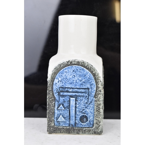 46 - A Troika pottery spice jar by Avril Bennet, the four sides with incised geometric designs on a white... 