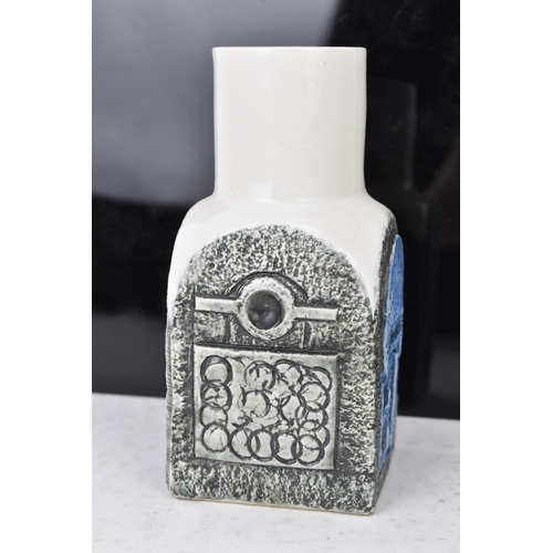 46 - A Troika pottery spice jar by Avril Bennet, the four sides with incised geometric designs on a white... 