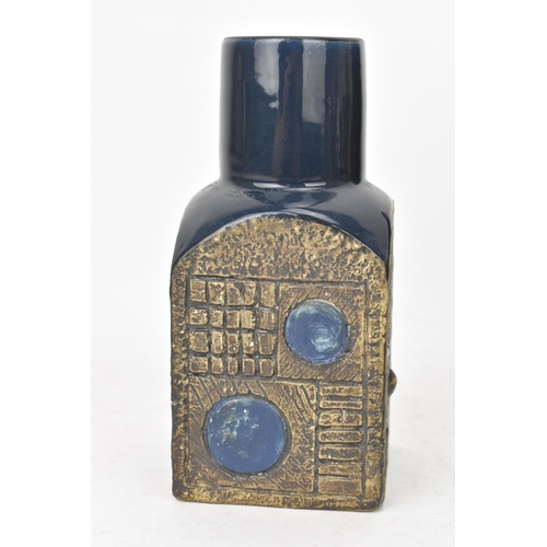 47 - A Troika pottery spice jar by Avril Bennet, the four sides with incised geometric designs on a blue ... 