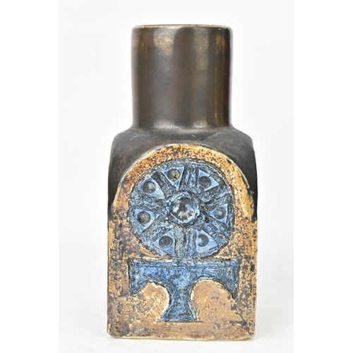 48 - A Troika pottery spice jar by Sue Lowe, the four sides with incised geometric designs on a brown gro... 