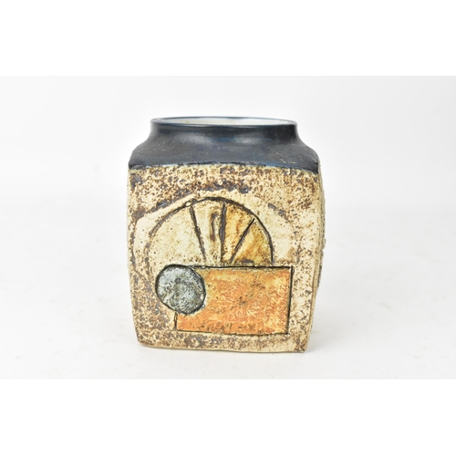 49 - A Troika marmalade jar by Eleanor Winning, the four sides with incised geometric designs, signed Tro... 