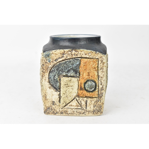 49 - A Troika marmalade jar by Eleanor Winning, the four sides with incised geometric designs, signed Tro... 