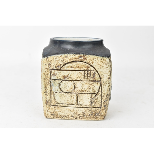 49 - A Troika marmalade jar by Eleanor Winning, the four sides with incised geometric designs, signed Tro... 