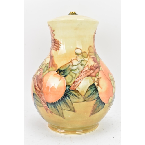 5 - A Moorcroft pottery 'Finches Ochre' pattern table lamp, designed by Sally Tuffin, circa 1990, of bal... 