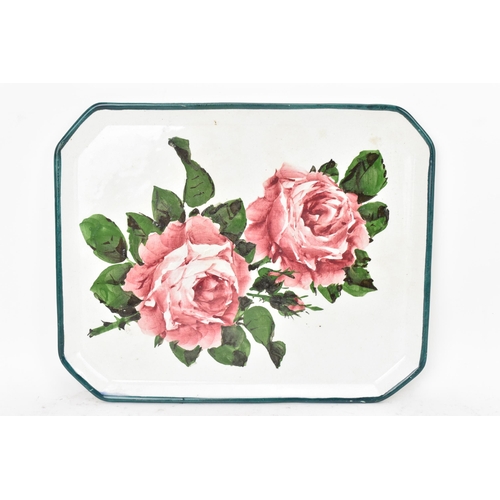 52 - An early 20th century Wemyss pottery comb tray, of octagonal form and painted with cabbage roses to ... 