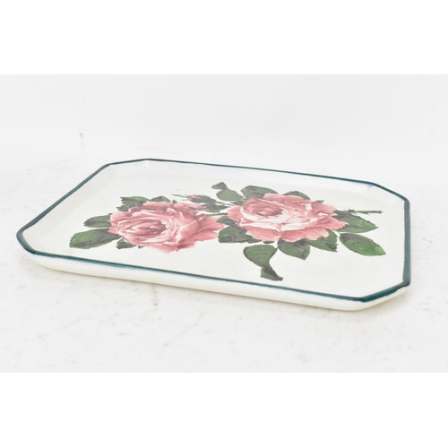 52 - An early 20th century Wemyss pottery comb tray, of octagonal form and painted with cabbage roses to ... 