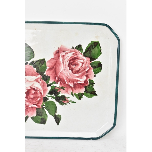 52 - An early 20th century Wemyss pottery comb tray, of octagonal form and painted with cabbage roses to ... 