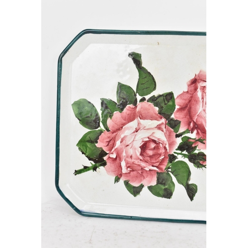 52 - An early 20th century Wemyss pottery comb tray, of octagonal form and painted with cabbage roses to ... 