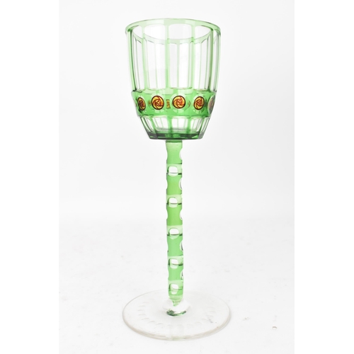 54 - An early 20th century Otto Prutscher for Meyr's Neffe painted cased and cut wine glass, each with gr... 