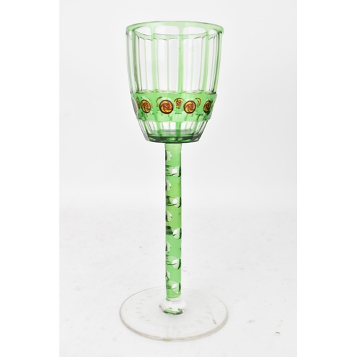 54 - An early 20th century Otto Prutscher for Meyr's Neffe painted cased and cut wine glass, each with gr... 