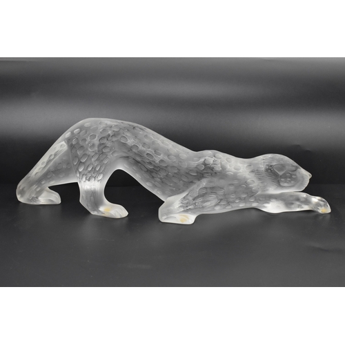 55 - A Lalique frosted glass sculpture, modelled as a prowling leopard, signed to the base, 10cm high x 3... 