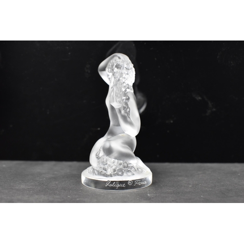 56 - A Lalique 'Floreal' frosted art glass study of a nude female seated, signed Lalique France to the ba... 