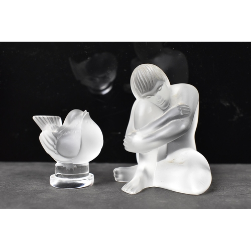 57 - A Lalique 'Nu Sage' frosted glass figure in the form of a seated nude, 7cm high x 7cm wide, together... 