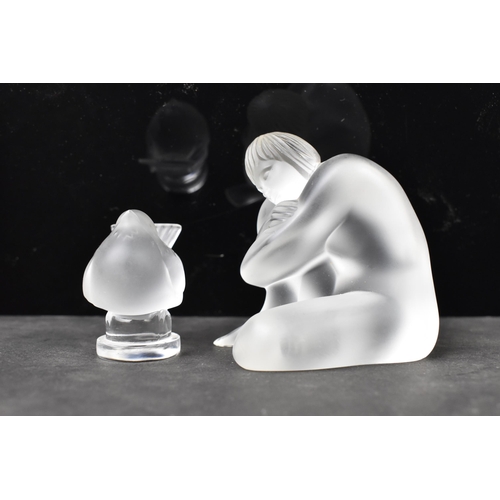 57 - A Lalique 'Nu Sage' frosted glass figure in the form of a seated nude, 7cm high x 7cm wide, together... 