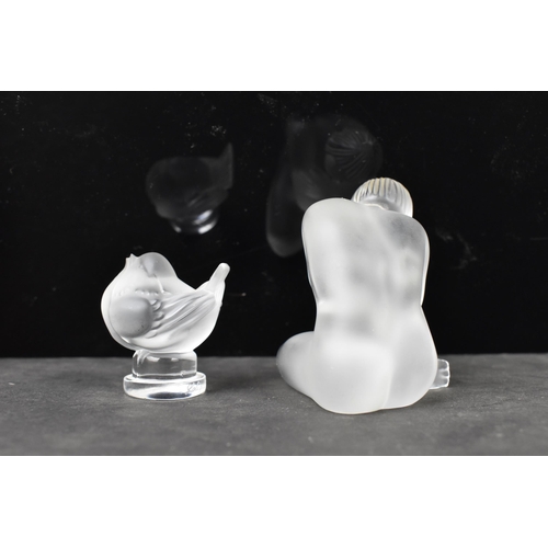 57 - A Lalique 'Nu Sage' frosted glass figure in the form of a seated nude, 7cm high x 7cm wide, together... 