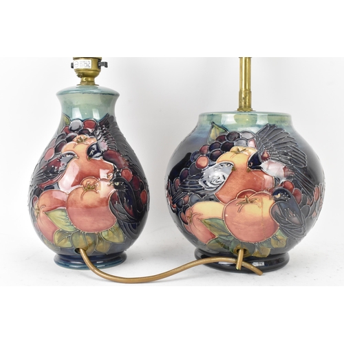 6 - Two Moorcroft pottery 'Finches and Fruit' pattern table lamps, designed by Sally Tuffin, each of bal... 