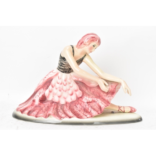 60 - A Goldscheidern Art Deco 'Swan Lake' Ceramic Figure of a ballerina, circa 1930s, the female modelled... 