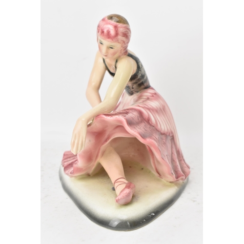 60 - A Goldscheidern Art Deco 'Swan Lake' Ceramic Figure of a ballerina, circa 1930s, the female modelled... 