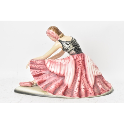 60 - A Goldscheidern Art Deco 'Swan Lake' Ceramic Figure of a ballerina, circa 1930s, the female modelled... 