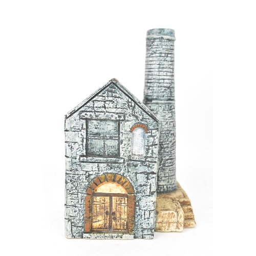 63 - A Troika pottery lamp base, by Jane Fitzgerald, in the form of a tin-mine workhouse and chimney, wit... 