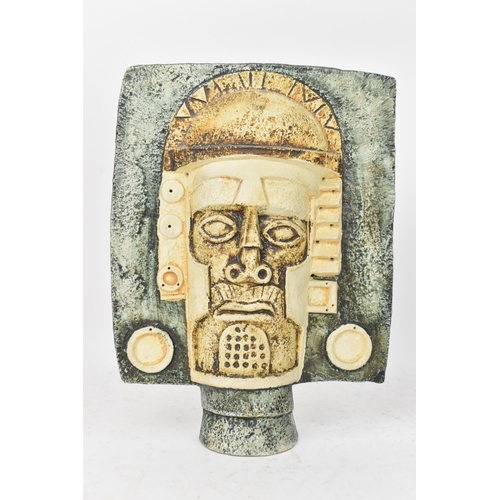 65 - A Troika pottery Aztec Mask by Tina Doubleday, both sides moulded in high relief with stylised faces... 