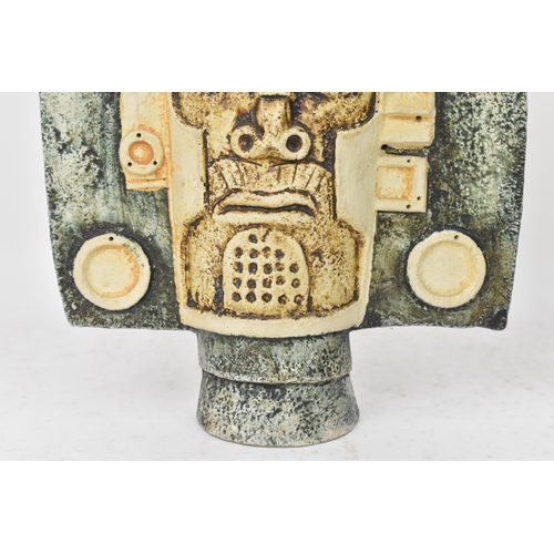 65 - A Troika pottery Aztec Mask by Tina Doubleday, both sides moulded in high relief with stylised faces... 