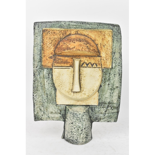 65 - A Troika pottery Aztec Mask by Tina Doubleday, both sides moulded in high relief with stylised faces... 