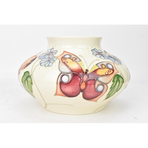 68 - A Moorcroft pottery 'Butterfly' pattern vase, circa 1993, of squat circular form, decorated with but... 