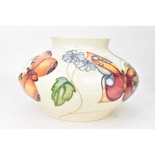 68 - A Moorcroft pottery 'Butterfly' pattern vase, circa 1993, of squat circular form, decorated with but... 