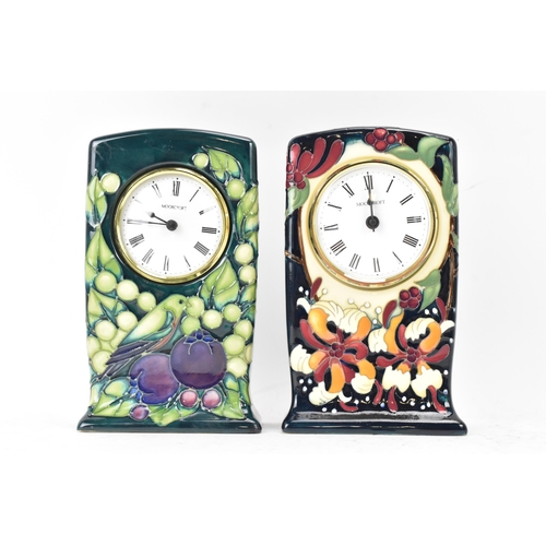 7 - Two Moorcroft pottery mantle clocks to include 'Finches and Fruit' pattern clock on a green ground, ... 